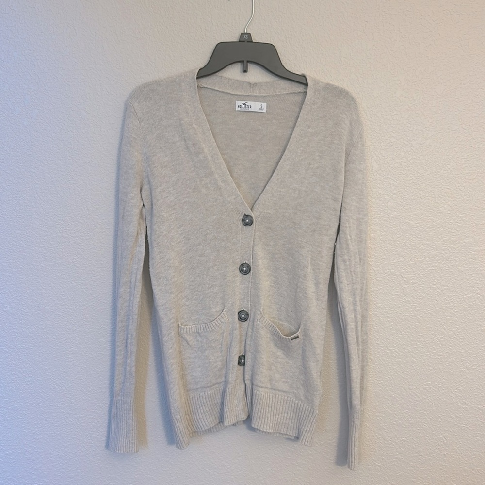 Gently used tan cardigan from Hollister size small.